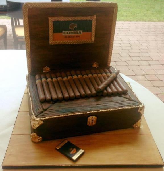 A real man's cake with strikingly realistic cigars made out of delicious frosting and cake! 
