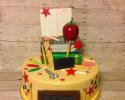 A great retirement cake for a teacher featuring school supplies.