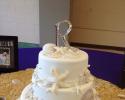 A seashell themed wedding cake.