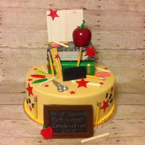A great retirement cake for a teacher featuring school supplies.